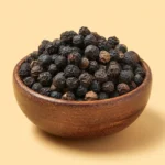 IZ VOZ EXIM Group_of_smoked_Malabar_black_pepper_in_wooden_bo_37c846b2-3978-4952-b9c1-0520e303e8c5_2Image