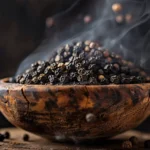 IZ VOZ EXIM close-up_of_smoked_Malabar_black_peppercorns_in_a_7ad462fc-02f2-4145-b3af-29d6db14c7e4_2